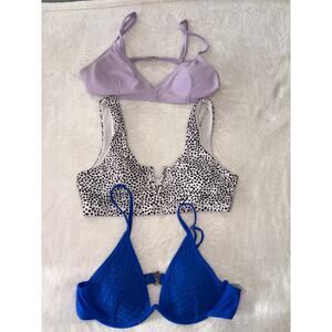 Bikini a lot size small. Purple, white and black polka dot and blue.